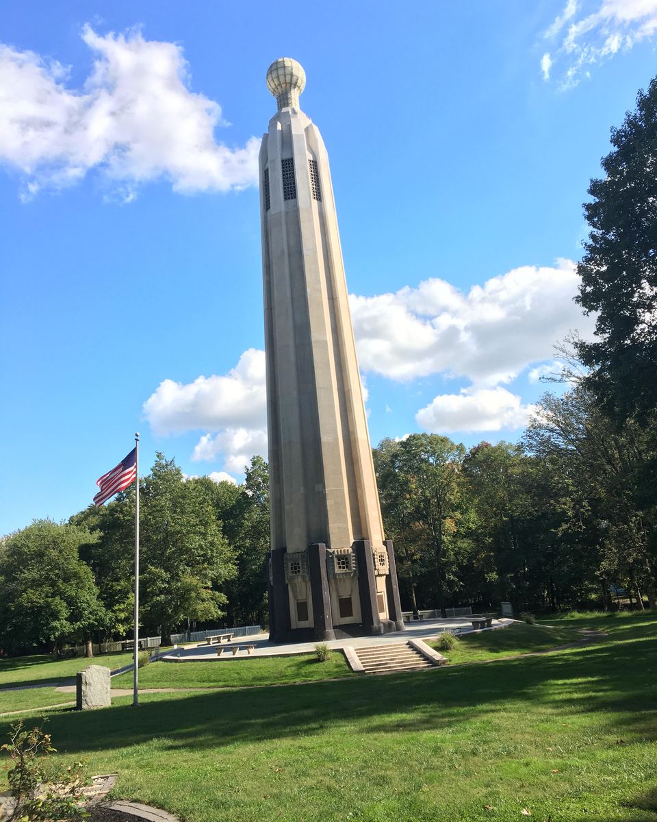 Thomas Edison Memorial Tower in Menlo Park, Edison, New Jersey, under a blue sky