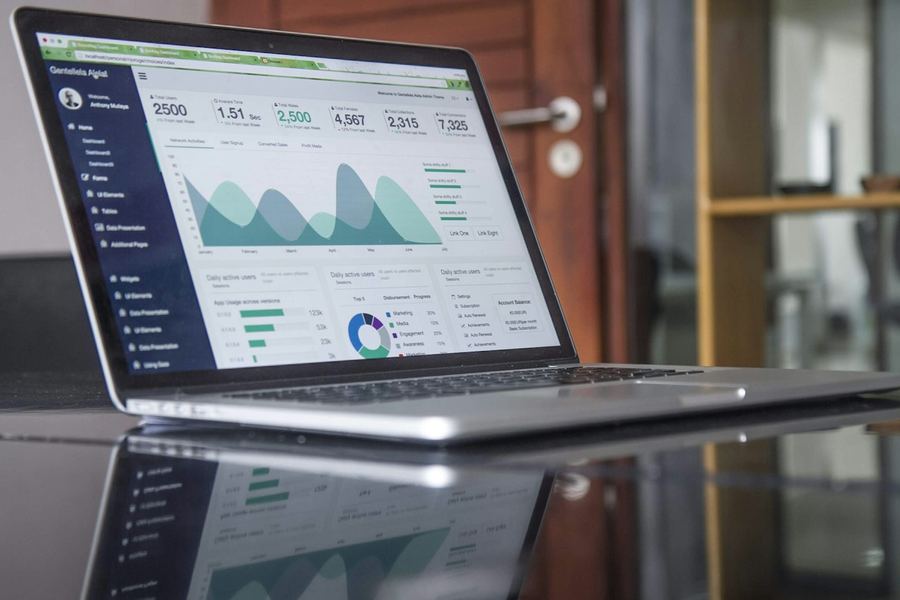 Laptop showing a financial dashboard